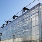 Shade curtain system for commercial greenhouse