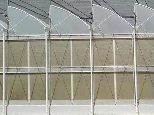 Half-arch sawtooth greenhouse by INSONGREEN