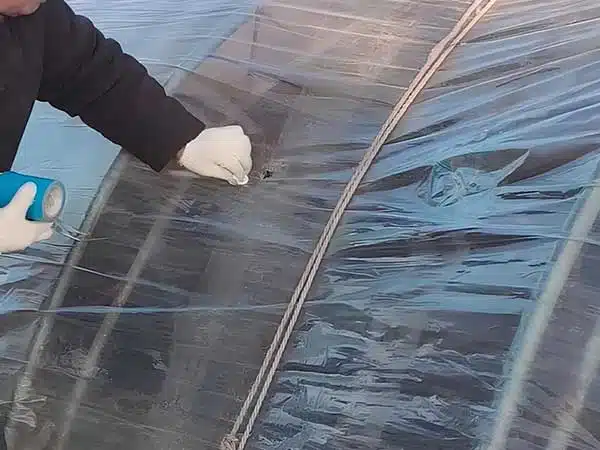 There is a hole in the polytunnel