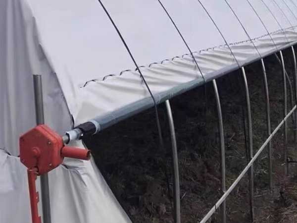The manual crank system for polytunnel blackout